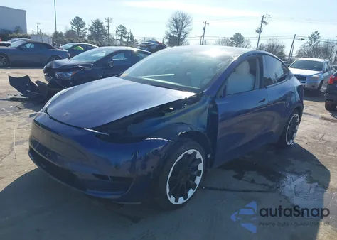 2021 Tesla Model Y Standard Range Rear-Wheel Drive from USA, damaged, VIN 5YJYGDED4MF123082
